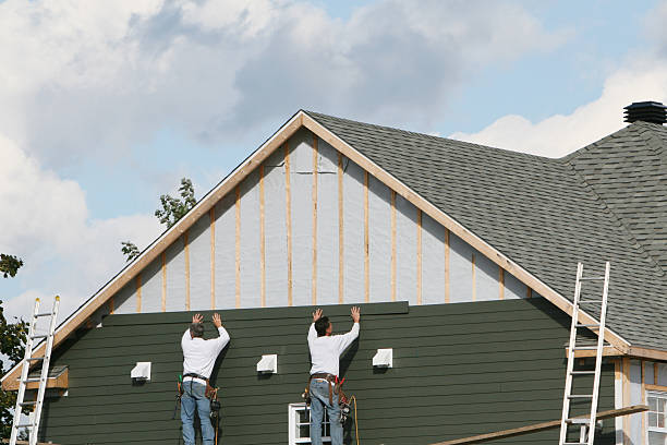 Professional Emergency Siding Repair technician working in Aultman, PA